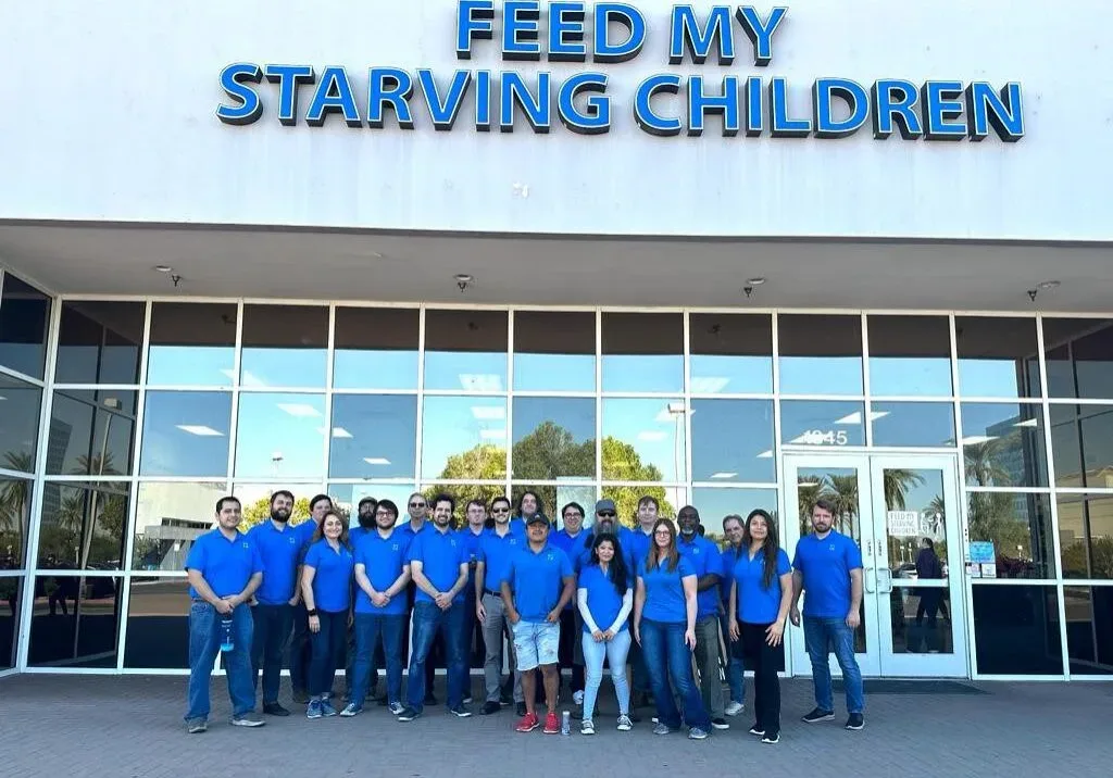 GCTS Helps Pack 141 Boxes of Meals for Starving Children during Team Building Event